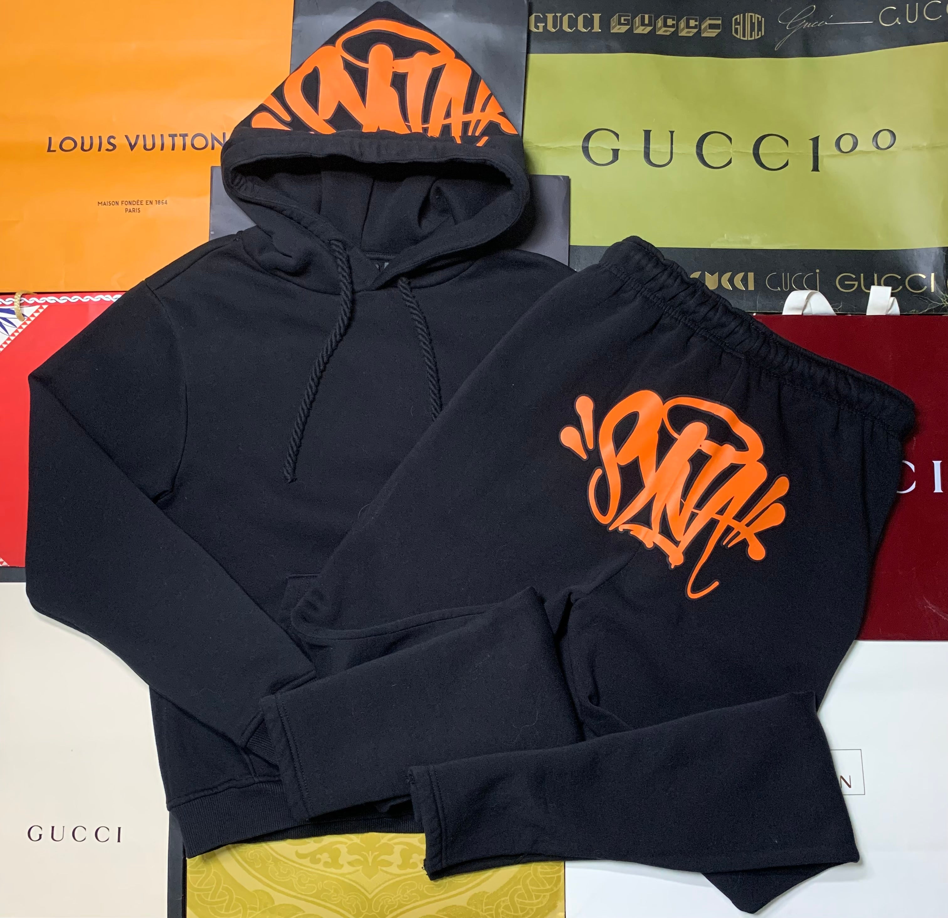 Syna world tracksuit orange/black