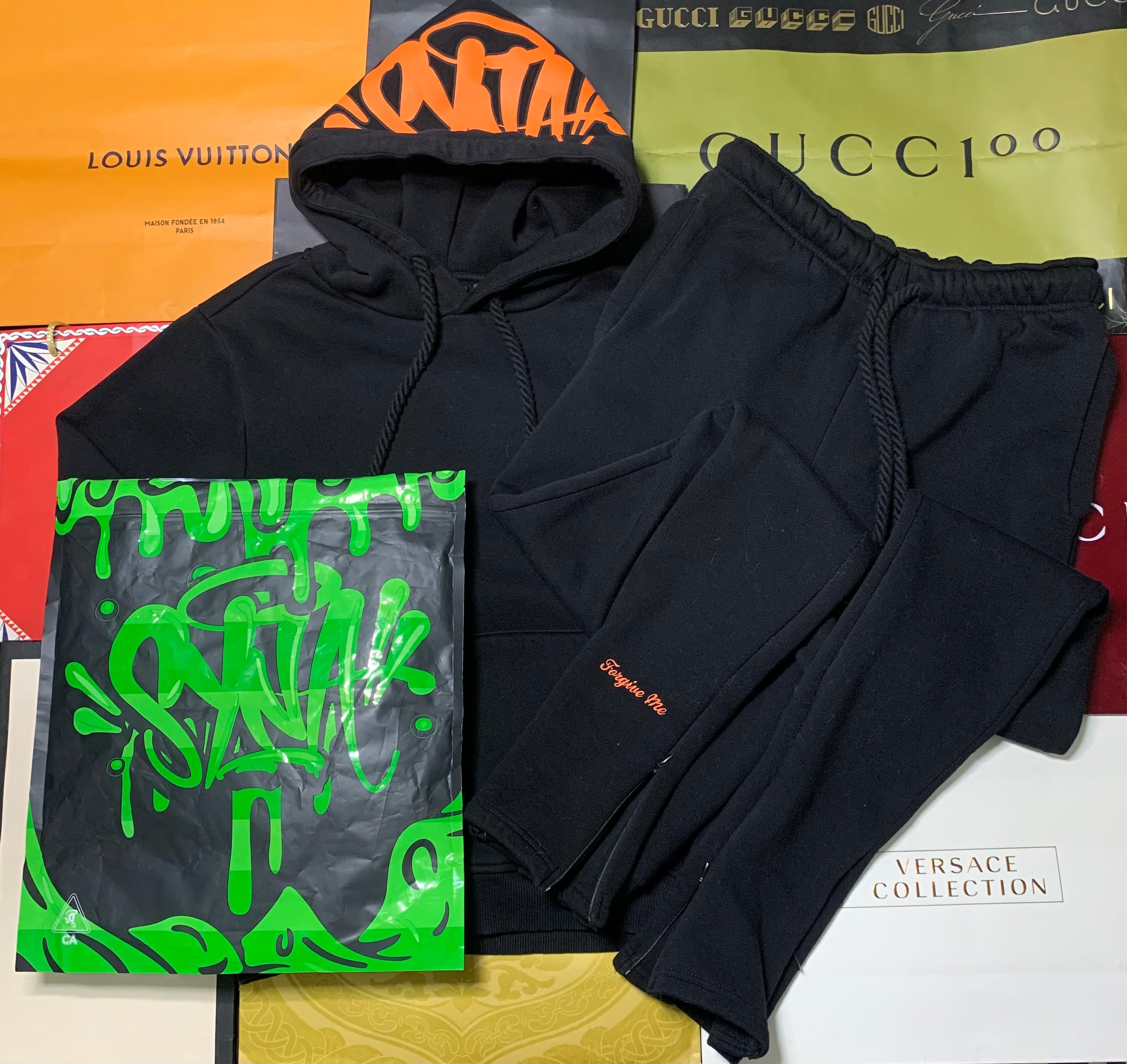 Syna world tracksuit orange/black