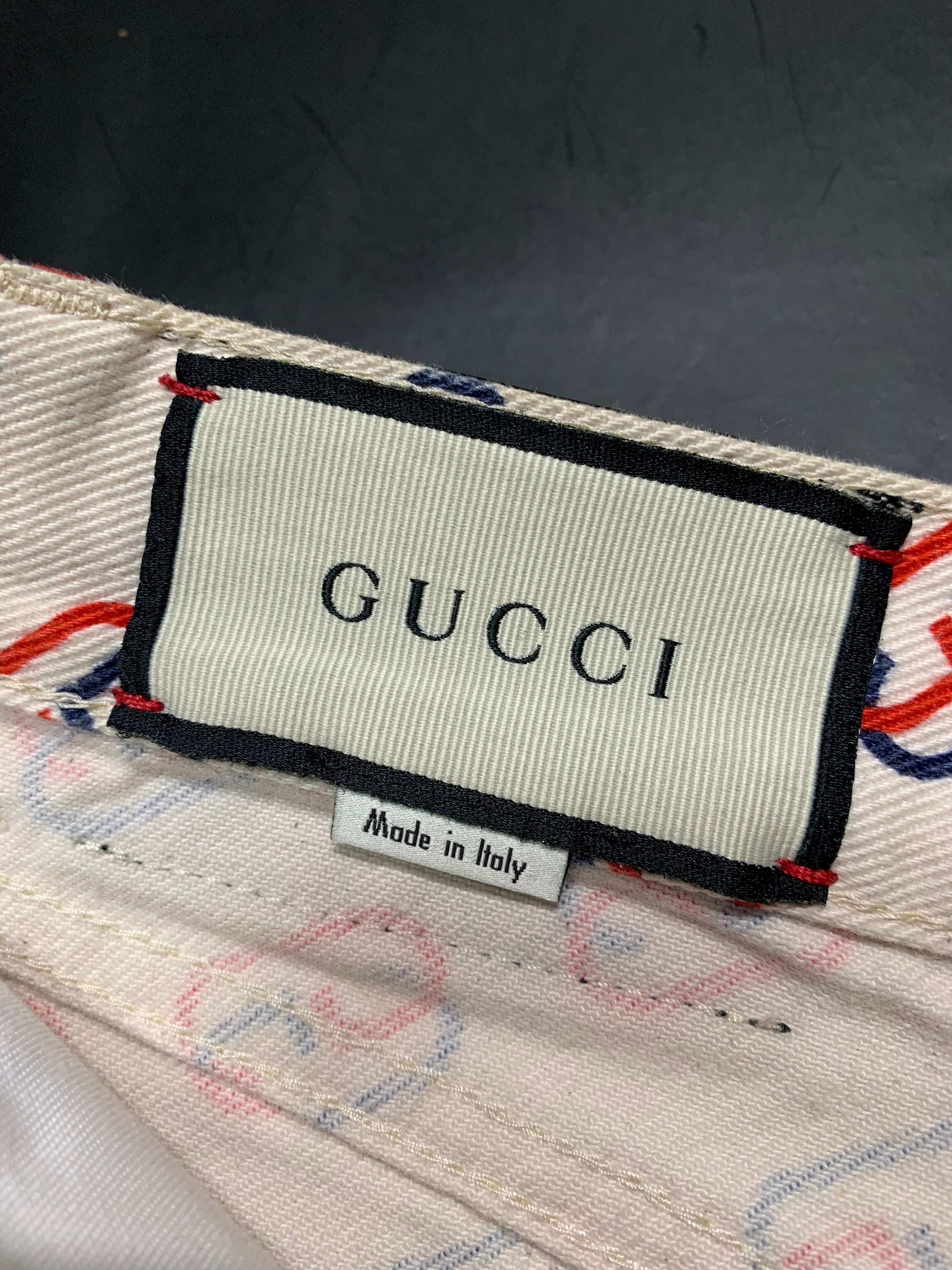 Gucci logo monogram print twil shorts