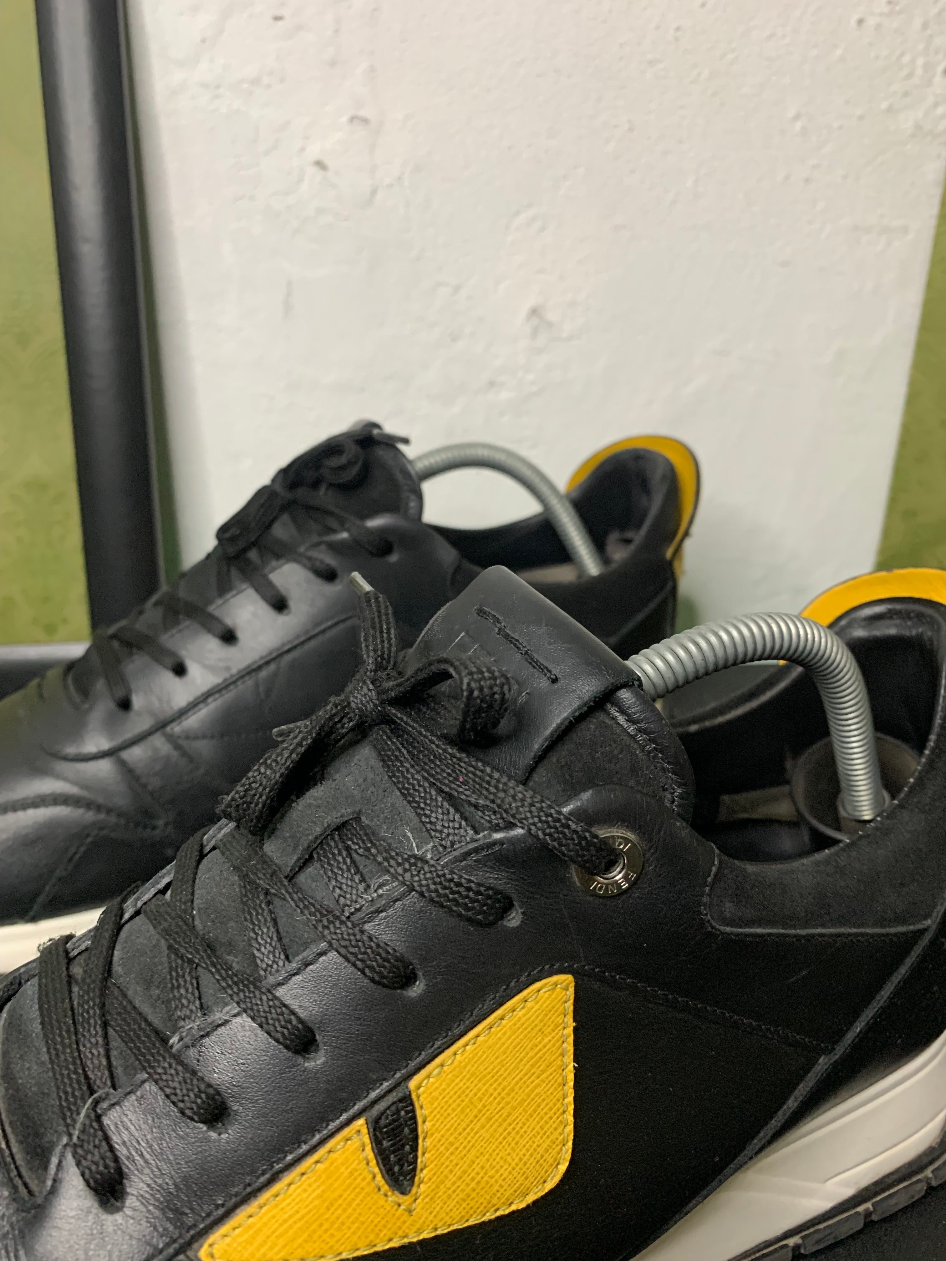 Fendi monster runner spike back
